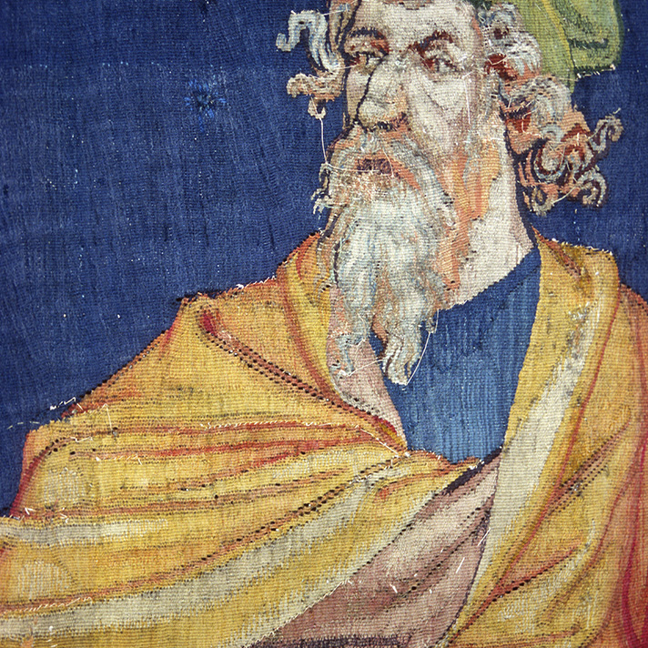 Apocalypse Tapestry, detail of a man. Scene “The Tears of Saint John”. Photograph taken from the reverse side.