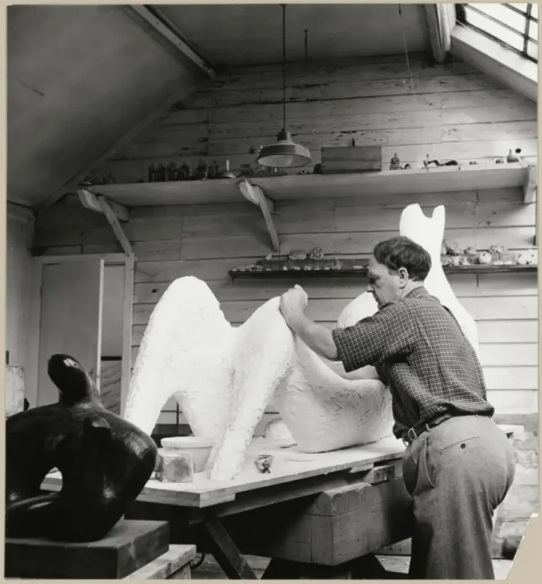 Henry Moore in his studio at Hoglands, Perry Green in Hertfordshire, working on ‘Reclining Figure’ for the 1951 Festival of Britain. © Historic England Archive. OP32771