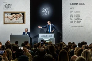 Portrait of Adrien Meyer, global head-private sales and co-chairman of Impressionist and modern art, selling Lucian Freud’s Ria, Naked Portrait,2006–07, at Christie’s, 2024. Courtesy of Christie’s.