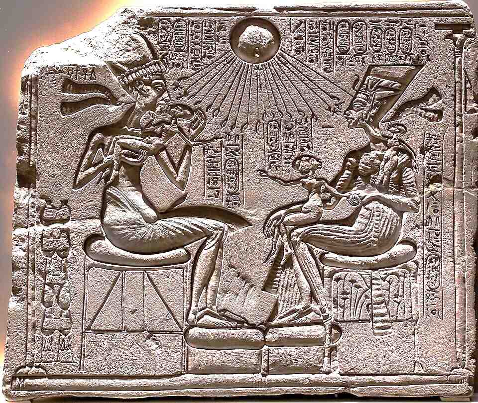 Relief depicting Akhenaton and Nefertiti with three of their daughters under the rays of Aton